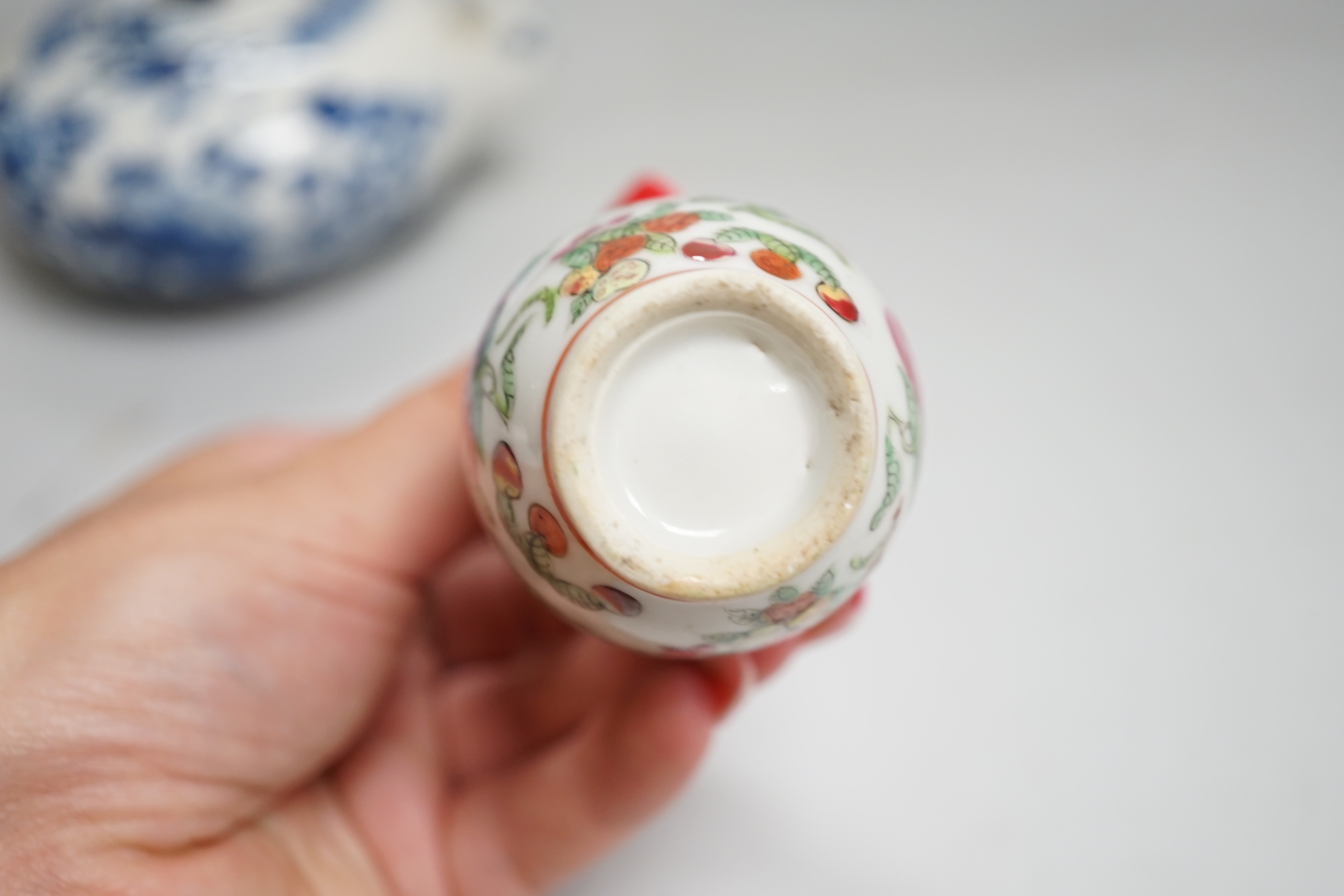 Chinese blue and white ceramics and a miniature famille rose vase, the largest 25cm high